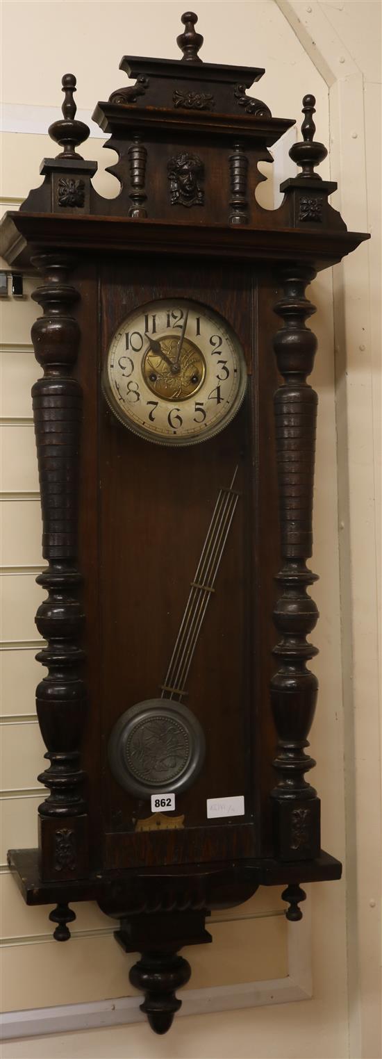 A Vienna style wall clock W.47cm.